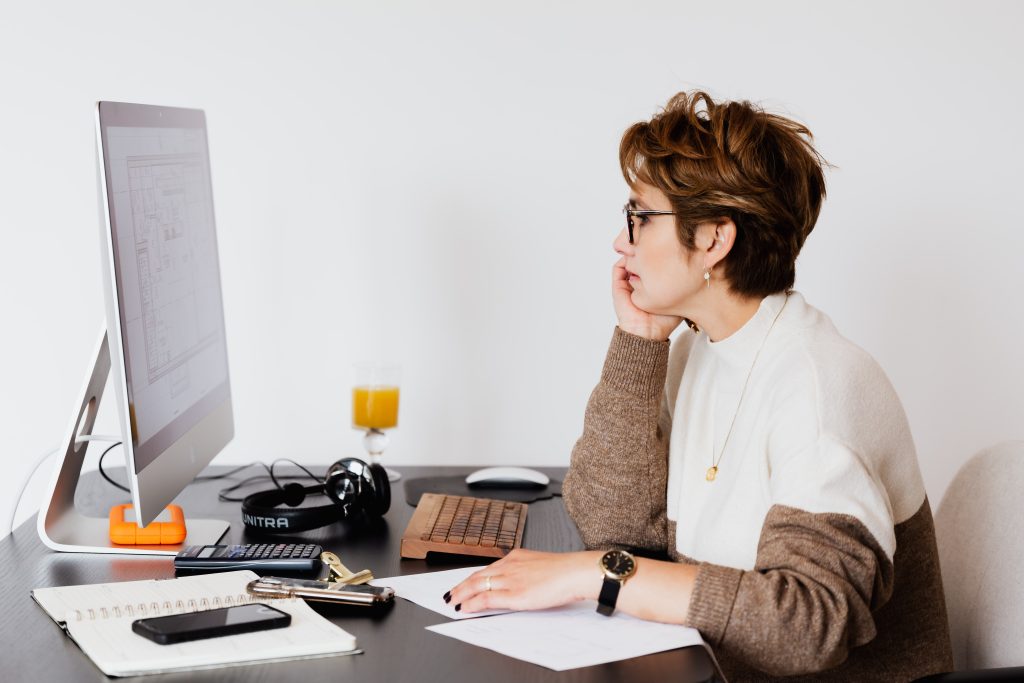 Woman looking at a computer